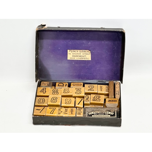 515 - Percy Leslie. An Early 20th Century rubber stamp and ink set.