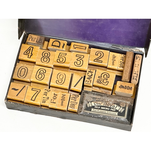 515 - Percy Leslie. An Early 20th Century rubber stamp and ink set.