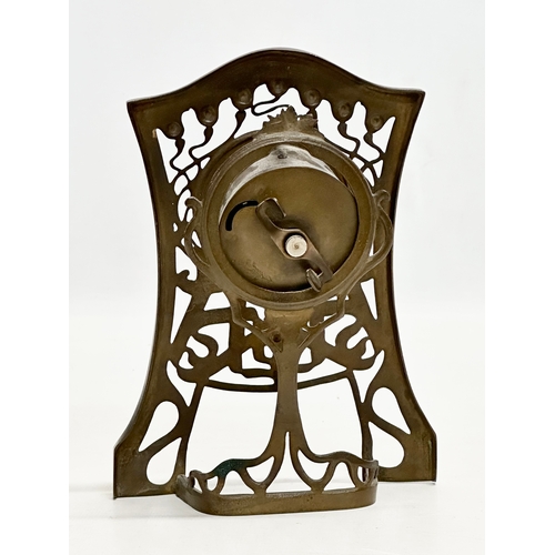 518 - An Early 20th Century Art Nouveau brass framed mantle clock. Junghans. 14x4x19cm