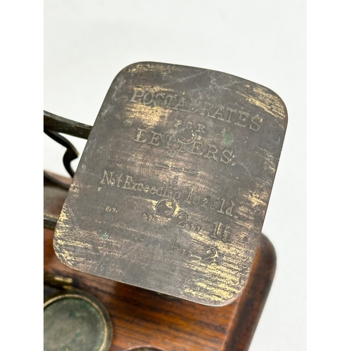 519 - Two Late 19th Century postal scales with weights.