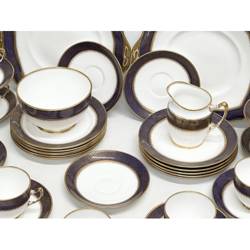 240 - Royal Albert. A 1920’s 36 piece Royal Albert gilt and cobalt blue crown china tea service.