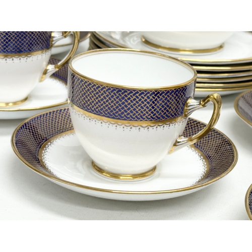 240 - Royal Albert. A 1920’s 36 piece Royal Albert gilt and cobalt blue crown china tea service.