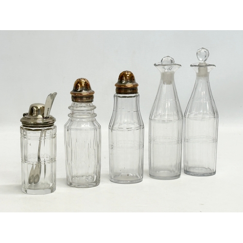 147 - A large Late 19th Century Victorian cruet set. Silver plate on copper. Vinegar bottles, salt and pep... 