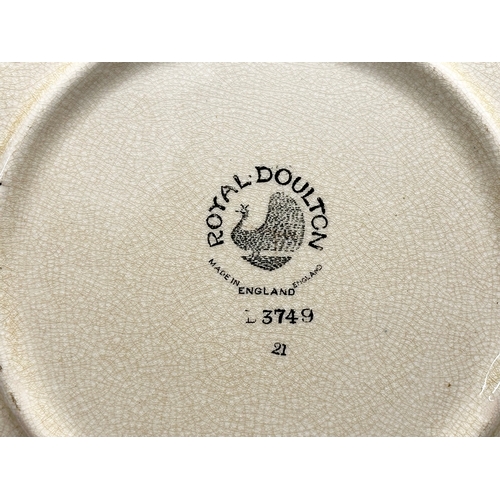 206 - Royal Doulton Sampler. A set of 12 Early 20th Century Royal Doulton plates in the Sampler pattern. C... 