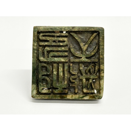 217 - A Chinese jade stone seal. 5x5x4cm