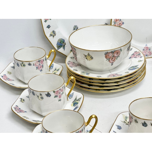 87 - Paroutaud Freres, Limoges. An Early 20th Century 39 piece French gilt tea service. By Paroutaud Frer... 