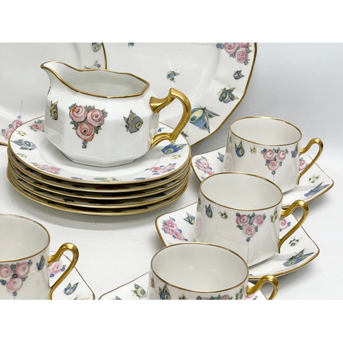 87 - Paroutaud Freres, Limoges. An Early 20th Century 39 piece French gilt tea service. By Paroutaud Frer... 