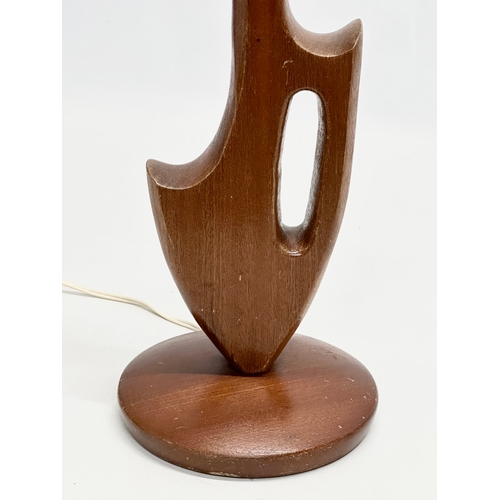 169 - A 1960’s Mid Century teak table lamp. 39cm