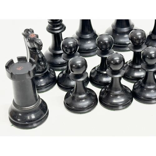 82 - A complete “Staunton” chess set. With red crown mark. Late 19th/Early 20th Century. Hand turned and ... 