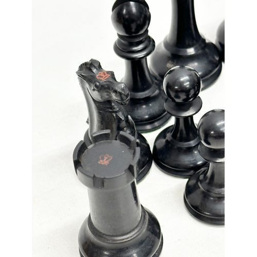 82 - A complete “Staunton” chess set. With red crown mark. Late 19th/Early 20th Century. Hand turned and ... 