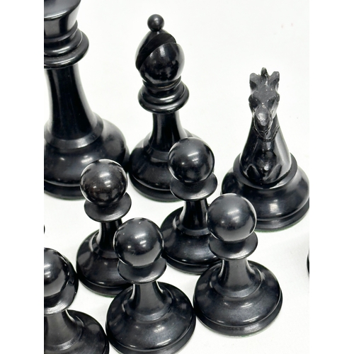 82 - A complete “Staunton” chess set. With red crown mark. Late 19th/Early 20th Century. Hand turned and ... 