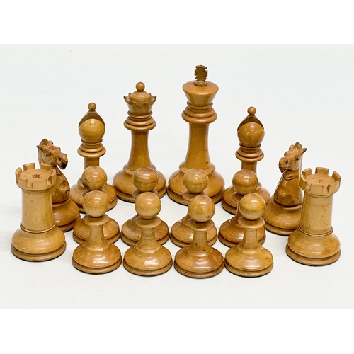 82 - A complete “Staunton” chess set. With red crown mark. Late 19th/Early 20th Century. Hand turned and ... 