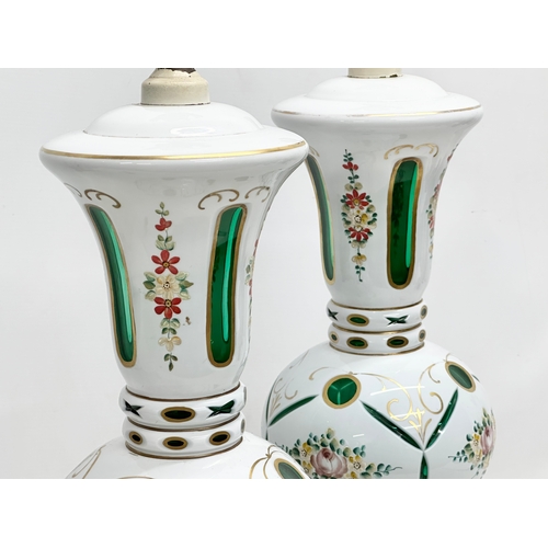 6 - A pair of large Early 20th Century Bohemian enamelled glass table lamps, on gilt brass bases. 23x59c... 