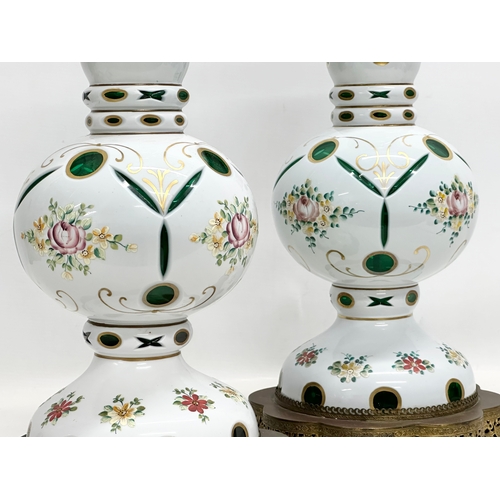 6 - A pair of large Early 20th Century Bohemian enamelled glass table lamps, on gilt brass bases. 23x59c... 