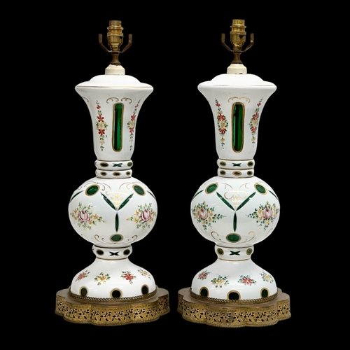 6 - A pair of large Early 20th Century Bohemian enamelled glass table lamps, on gilt brass bases. 23x59c... 