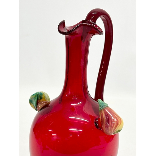 152 - A ruby glass jug. 11x9x20.5cm.