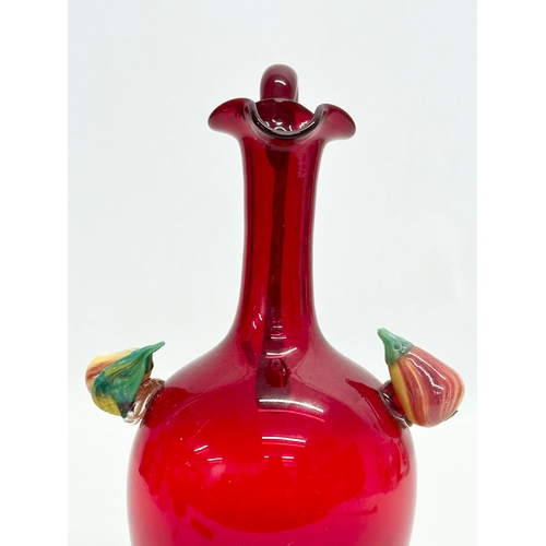 152 - A ruby glass jug. 11x9x20.5cm.