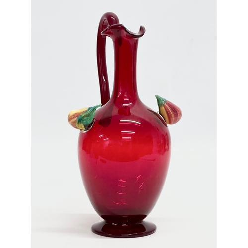 152 - A ruby glass jug. 11x9x20.5cm.