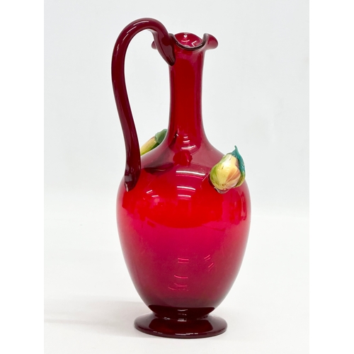 152 - A ruby glass jug. 11x9x20.5cm.