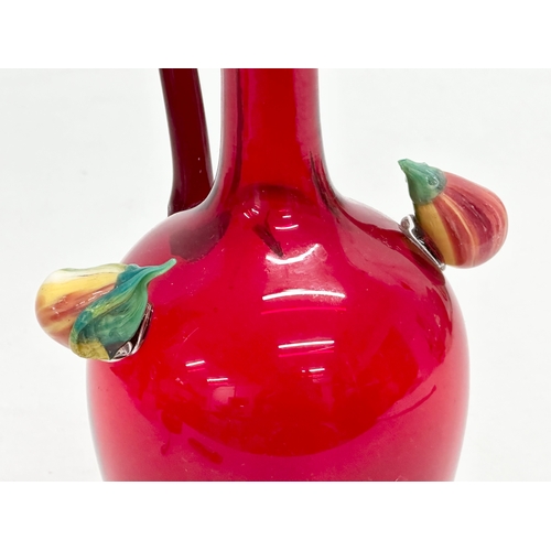 152 - A ruby glass jug. 11x9x20.5cm.