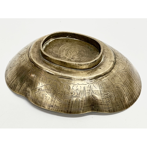 196 - A Late 19th Century Chinese engraved brass bowl. 29x22x8cm.