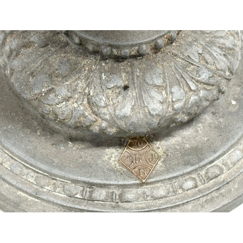 198 - A Late 19th Century pewter urn with cover. Converted into a lamp. With dancing cherub putti relief. ... 