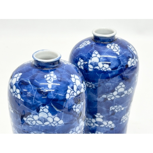 97 - A pair of Late 19th Century Chinese prunus pattern vases. 15cm.