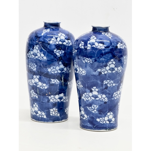 97 - A pair of Late 19th Century Chinese prunus pattern vases. 15cm.