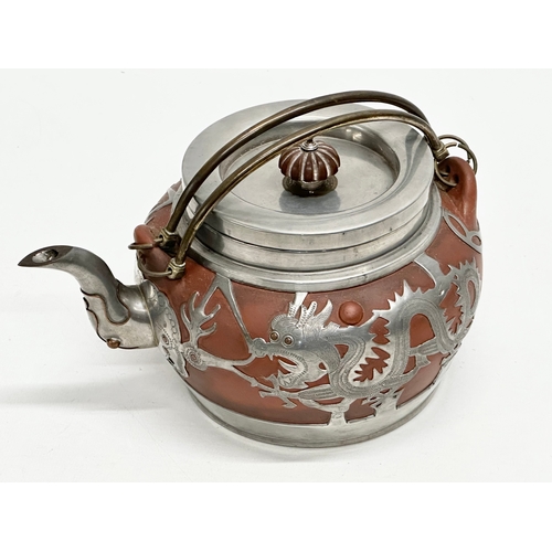 99 - A Late 19th/Early 20th Century Chinese pewter mounted Yixing teapot. Impressed seal mark on bottom. ... 