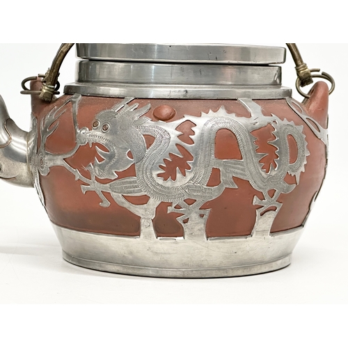 99 - A Late 19th/Early 20th Century Chinese pewter mounted Yixing teapot. Impressed seal mark on bottom. ... 