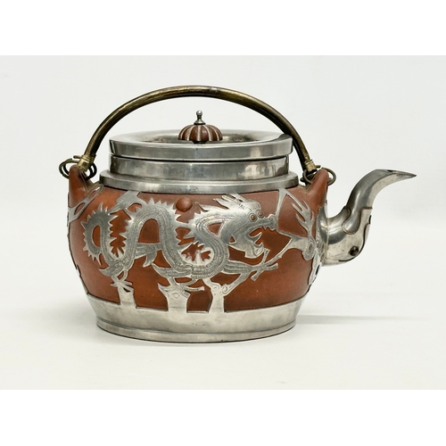 99 - A Late 19th/Early 20th Century Chinese pewter mounted Yixing teapot. Impressed seal mark on bottom. ... 