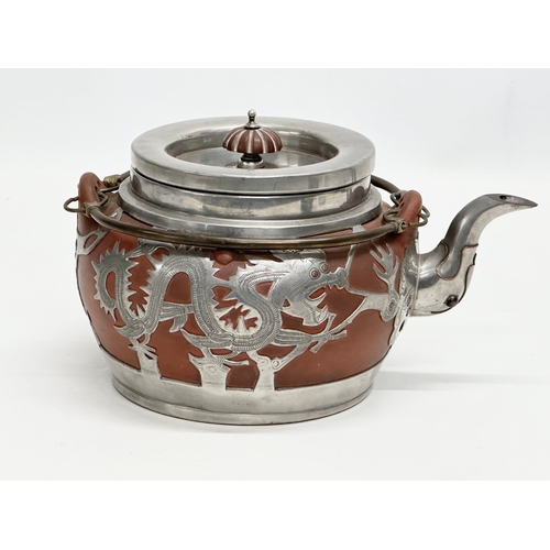 99 - A Late 19th/Early 20th Century Chinese pewter mounted Yixing teapot. Impressed seal mark on bottom. ... 