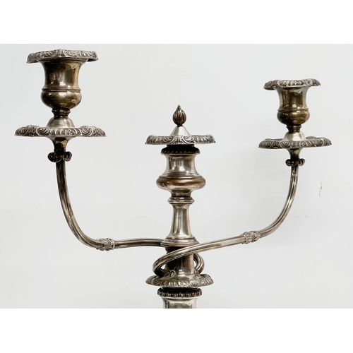 48 - A large 19th Century silver plate on copper candelabra. 48x57cm.