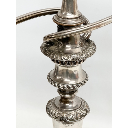 48 - A large 19th Century silver plate on copper candelabra. 48x57cm.