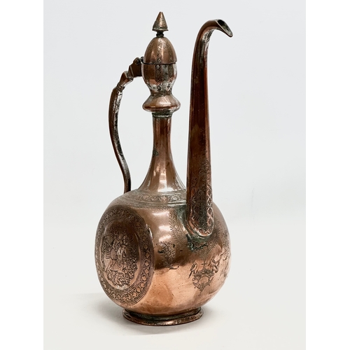 50 - A Late 18th/Early 19th Century Afghan engraved copper ewer. 19x12x35cm