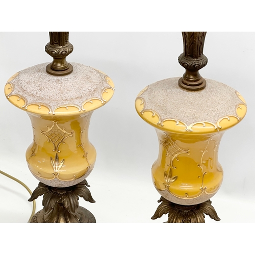 15 - A pair of large Mid 20th Century American glass table lamps with brass column and base. Base measure... 