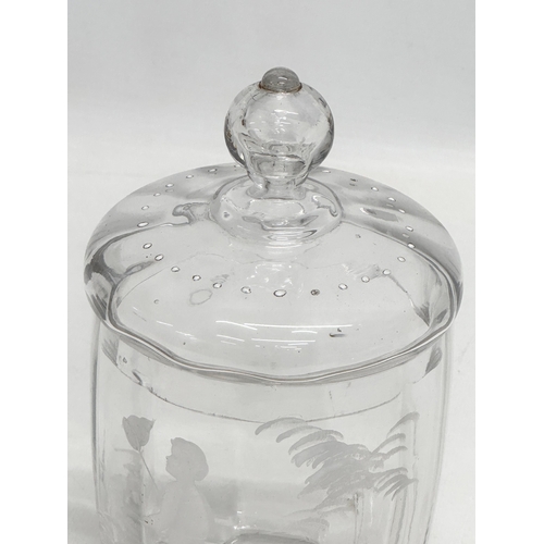 246 - 2 pieces of Victorian glassware. A Late 19th Century Mary Gregory jar with lid, together with a hand... 