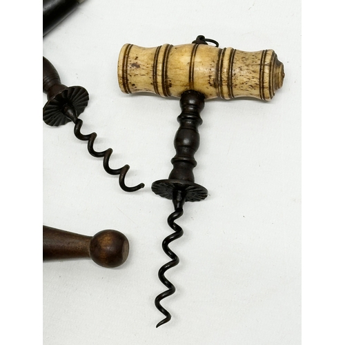 326 - A collection of 19th Century corkscrews.