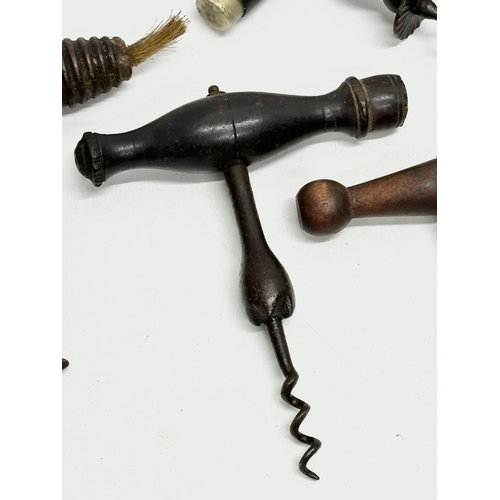 326 - A collection of 19th Century corkscrews.