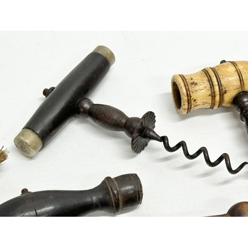 326 - A collection of 19th Century corkscrews.