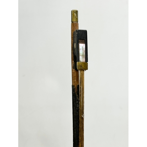 177 - A 19th/Early 20th Century violin and bow. 60cm