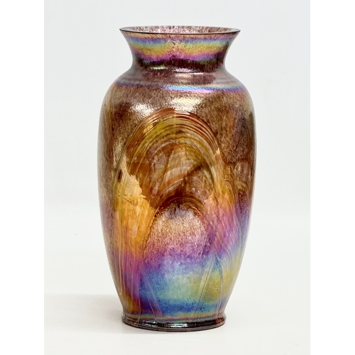 31 - A 20th Century Bohemian iridescent glass baluster vase. 22.5cm.