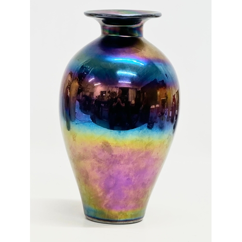 32 - A 20th Century Swedish iridescent studio glass baluster vase. 27cm