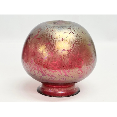 33 - Michael Harris. A 20th Century iridescent studio glass bulbous vase. Designed by Michael Harris for ... 