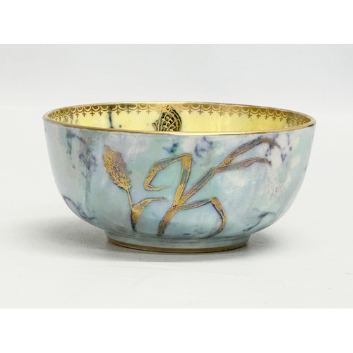 42 - A 1920’s Anysley Pottery “Fairyland” lustre bowl. 11x5cm.