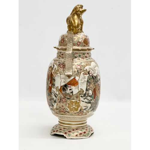 53 - An Early 20th Century Japanese hand painted 2 handled vase with cover. With immortals and foo dog de... 