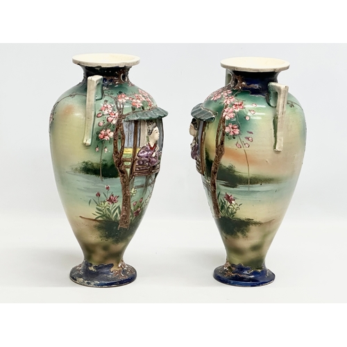 55 - A pair of large signed Early 20th Century Japanese hand painted, 2 handled baluster vases. By Satsum... 