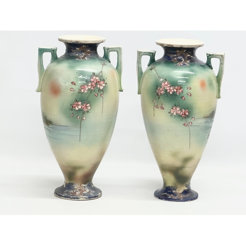 55 - A pair of large signed Early 20th Century Japanese hand painted, 2 handled baluster vases. By Satsum... 