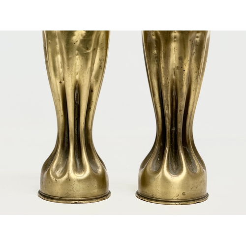 179 - A pair of large brass Art Nouveau style Trench Art vases. WWI. 34.5cm.