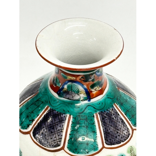 278 - A signed Late 19th/Early 20th Century Japanese hand painted baluster vase, by Kutani. 19cm